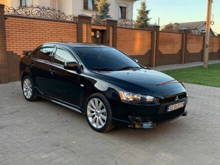 Чорний Міцубісі Lancer, об'ємом двигуна 2 л та пробігом 240 тис. км за 7000 $, фото 1 на Automoto.ua