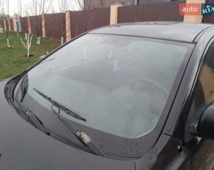 Черный Мицубиси Лансер, объемом двигателя 1 л и пробегом 400 тыс. км за 4700 $, фото 1 на Automoto.ua