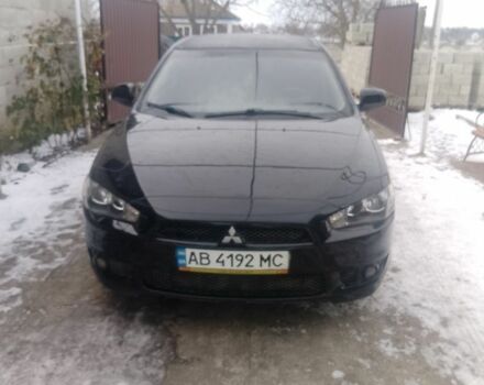 Черный Мицубиси Лансер, объемом двигателя 2 л и пробегом 200 тыс. км за 5400 $, фото 1 на Automoto.ua