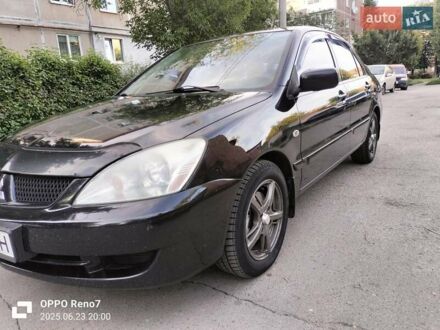 Мицубиси Лансер 2008 в Белой Церкве на Automoto.ua Черный Мицубиси Лансер, объемом двигателя 1.6 л и пробегом 194 тыс. км за 4200 $, фото 1 на Automoto.ua