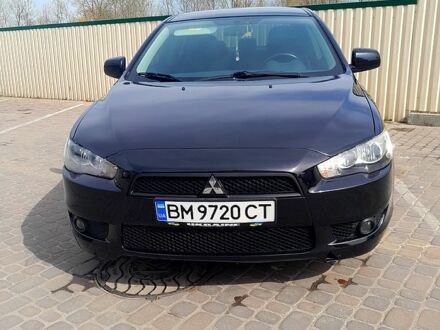 Чорний Міцубісі Lancer, об'ємом двигуна 2 л та пробігом 105 тис. км за 7800 $, фото 1 на Automoto.ua