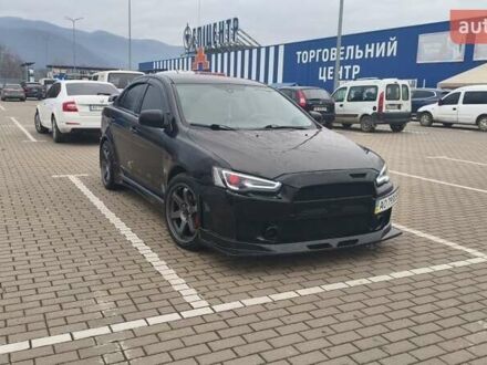 Чорний Міцубісі Lancer, об'ємом двигуна 2 л та пробігом 160 тис. км за 8000 $, фото 1 на Automoto.ua
