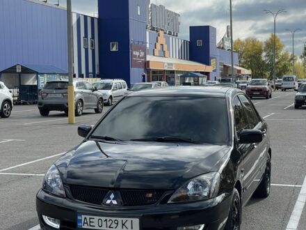 Чорний Міцубісі Lancer, об'ємом двигуна 1.6 л та пробігом 188 тис. км за 2200 $, фото 1 на Automoto.ua