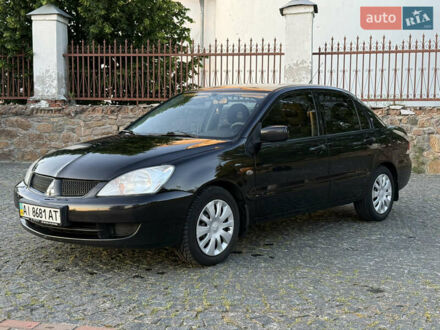 Мицубиси Лансер 2008 в Белой Церкве на Automoto.ua Черный Мицубиси Лансер, объемом двигателя 1.6 л и пробегом 242 тыс. км за 4799 $, фото 1 на Automoto.ua