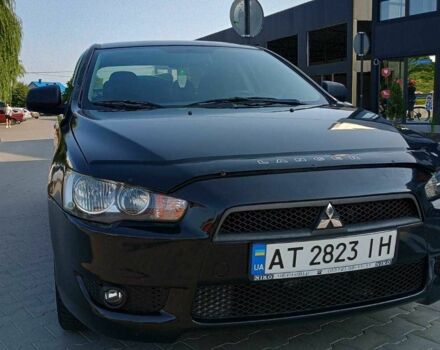 Чорний Міцубісі Lancer, об'ємом двигуна 2 л та пробігом 145 тис. км за 5000 $, фото 1 на Automoto.ua