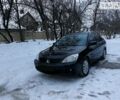 Чорний Міцубісі Lancer, об'ємом двигуна 1.6 л та пробігом 187 тис. км за 5600 $, фото 1 на Automoto.ua