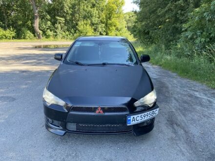 Чорний Міцубісі Lancer, об'ємом двигуна 2 л та пробігом 303 тис. км за 5995 $, фото 1 на Automoto.ua