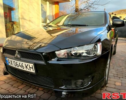 Чорний Міцубісі Lancer, об'ємом двигуна 2 л та пробігом 162 тис. км за 7500 $, фото 1 на Automoto.ua