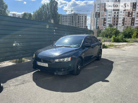 Чорний Міцубісі Lancer, об'ємом двигуна 2 л та пробігом 215 тис. км за 7600 $, фото 1 на Automoto.ua