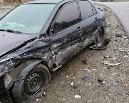 Чорний Міцубісі Lancer, об'ємом двигуна 1.6 л та пробігом 340 тис. км за 1776 $, фото 1 на Automoto.ua