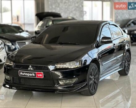Чорний Міцубісі Lancer, об'ємом двигуна 2 л та пробігом 313 тис. км за 7690 $, фото 1 на Automoto.ua