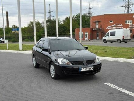 Мицубиси Лансер 2009 в Днепре (Днепропетровске) на Automoto.ua Черный Мицубиси Лансер, объемом двигателя 1.6 л и пробегом 287 тыс. км за 4799 $, фото 1 на Automoto.ua