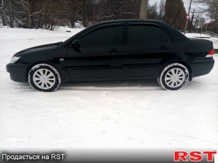 Чорний Міцубісі Lancer, об'ємом двигуна 1.6 л та пробігом 94 тис. км за 6200 $, фото 1 на Automoto.ua