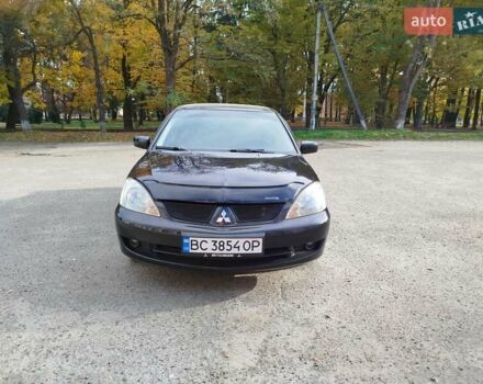 Черный Мицубиси Лансер, объемом двигателя 1.58 л и пробегом 78 тыс. км за 6500 $, фото 1 на Automoto.ua