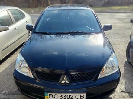 Чорний Міцубісі Lancer, об'ємом двигуна 1.6 л та пробігом 202 тис. км за 5000 $, фото 1 на Automoto.ua