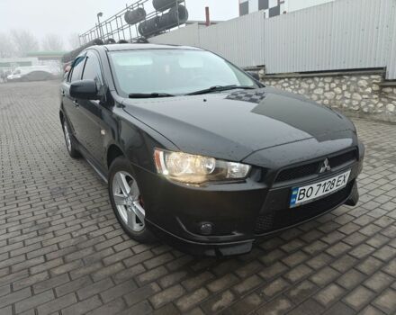 Черный Мицубиси Лансер, объемом двигателя 2 л и пробегом 228 тыс. км за 7000 $, фото 1 на Automoto.ua