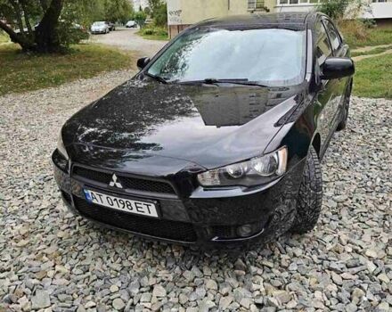 Чорний Міцубісі Lancer, об'ємом двигуна 2 л та пробігом 214 тис. км за 6100 $, фото 1 на Automoto.ua
