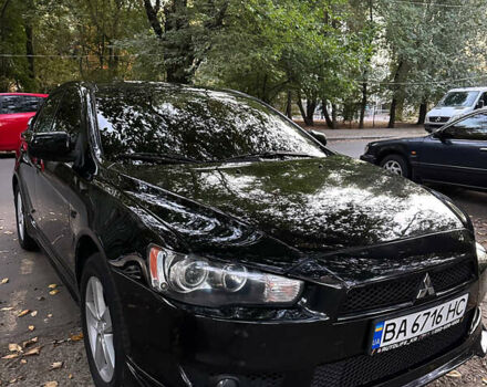Чорний Міцубісі Lancer, об'ємом двигуна 2 л та пробігом 253 тис. км за 7300 $, фото 1 на Automoto.ua