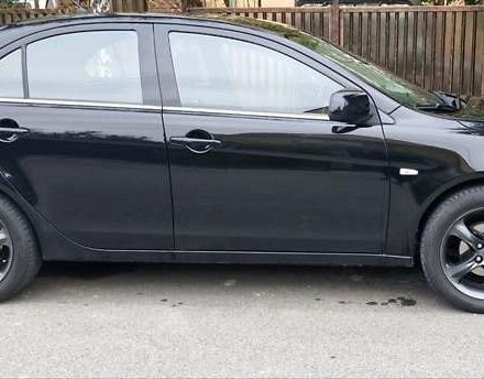Чорний Міцубісі Lancer, об'ємом двигуна 1.8 л та пробігом 180 тис. км за 7200 $, фото 1 на Automoto.ua
