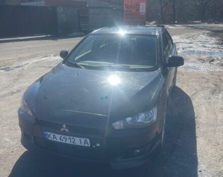 Черный Мицубиси Лансер, объемом двигателя 2 л и пробегом 250 тыс. км за 6500 $, фото 1 на Automoto.ua