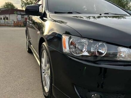 Міцубісі Lancer 2009 у Синельниковом на Automoto.ua Чорний Міцубісі Lancer, об'ємом двигуна 2 л та пробігом 195 тис. км за 6700 $, фото 1 на Automoto.ua