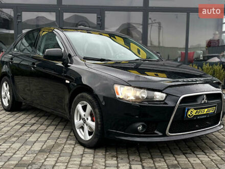 Міцубісі Lancer 2009 у Мукачеве на Automoto.ua Чорний Міцубісі Lancer, об'ємом двигуна 1.8 л та пробігом 174 тис. км за 8200 $, фото 1 на Automoto.ua
