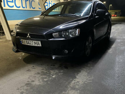 Черный Мицубиси Лансер, объемом двигателя 1.8 л и пробегом 220 тыс. км за 5500 $, фото 1 на Automoto.ua