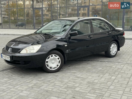 Чорний Міцубісі Lancer, об'ємом двигуна 1.58 л та пробігом 128 тис. км за 5999 $, фото 1 на Automoto.ua