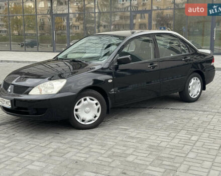Чорний Міцубісі Lancer, об'ємом двигуна 1.58 л та пробігом 128 тис. км за 5999 $, фото 1 на Automoto.ua