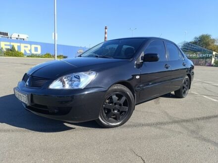 Міцубісі Lancer 2009 у Дніпро (Дніпропетровську) на Automoto.ua Чорний Міцубісі Lancer, об'ємом двигуна 1.6 л та пробігом 220 тис. км за 4700 $, фото 1 на Automoto.ua
