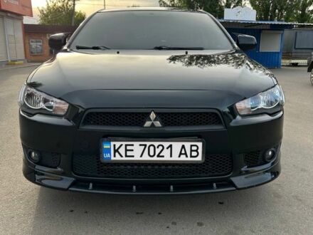 Міцубісі Lancer 2009 у Синельниковом на Automoto.ua Чорний Міцубісі Lancer, об'ємом двигуна 2 л та пробігом 195 тис. км за 6700 $, фото 1 на Automoto.ua