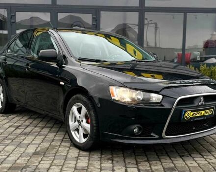 Чорний Міцубісі Lancer, об'ємом двигуна 1.8 л та пробігом 174 тис. км за 8200 $, фото 1 на Automoto.ua