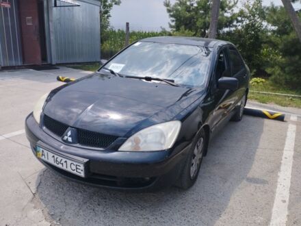 Міцубісі Lancer 2009 у Ладижин на Automoto.ua Чорний Міцубісі Lancer, об'ємом двигуна 1.6 л та пробігом 455 тис. км за 3075 $, фото 1 на Automoto.ua