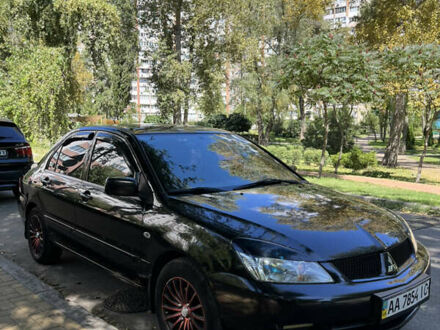 Мицубиси Лансер 2009 в Киеве на Automoto.ua Черный Мицубиси Лансер, объемом двигателя 1.58 л и пробегом 160 тыс. км за 5300 $, фото 1 на Automoto.ua