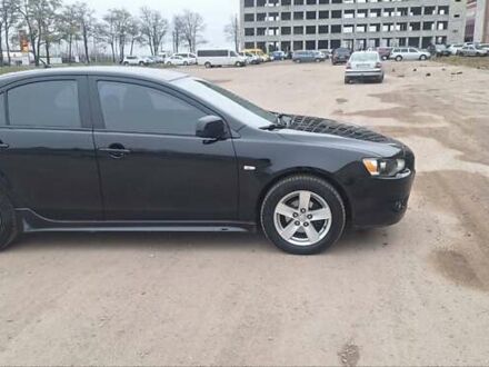 Черный Мицубиси Лансер, объемом двигателя 1.8 л и пробегом 213 тыс. км за 6200 $, фото 1 на Automoto.ua