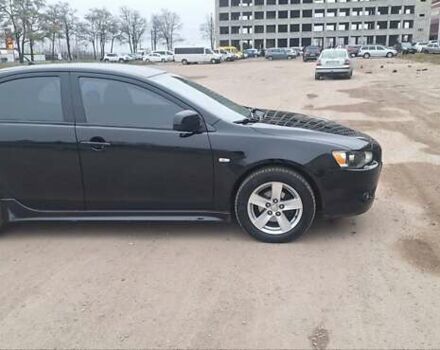 Чорний Міцубісі Lancer, об'ємом двигуна 1.8 л та пробігом 213 тис. км за 6200 $, фото 1 на Automoto.ua