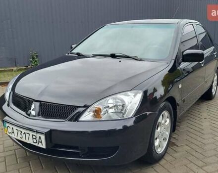 Чорний Міцубісі Lancer, об'ємом двигуна 1.6 л та пробігом 290 тис. км за 4350 $, фото 1 на Automoto.ua