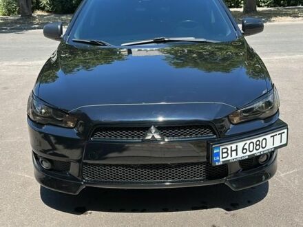 Чорний Міцубісі Lancer, об'ємом двигуна 2 л та пробігом 263 тис. км за 7500 $, фото 1 на Automoto.ua