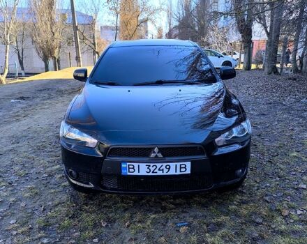 Черный Мицубиси Лансер, объемом двигателя 2 л и пробегом 217 тыс. км за 7900 $, фото 1 на Automoto.ua