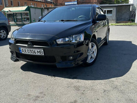 Чорний Міцубісі Lancer, об'ємом двигуна 2 л та пробігом 243 тис. км за 7400 $, фото 1 на Automoto.ua