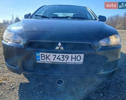 Черный Мицубиси Лансер, объемом двигателя 1.5 л и пробегом 256 тыс. км за 6100 $, фото 1 на Automoto.ua