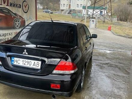 Мицубиси Лансер 2009 в Косове на Automoto.ua Черный Мицубиси Лансер, объемом двигателя 1.59 л и пробегом 309 тыс. км за 3900 $, фото 1 на Automoto.ua