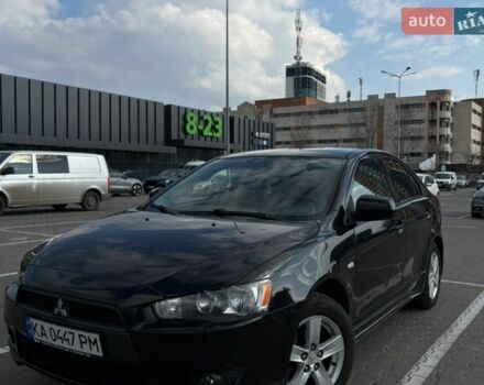 Черный Мицубиси Лансер, объемом двигателя 1.8 л и пробегом 273 тыс. км за 6000 $, фото 1 на Automoto.ua