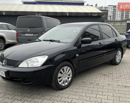 Чорний Міцубісі Lancer, об'ємом двигуна 1.6 л та пробігом 186 тис. км за 5500 $, фото 1 на Automoto.ua