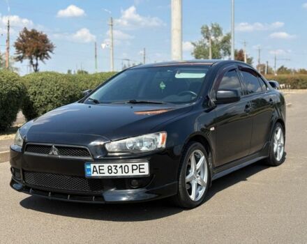 Чорний Міцубісі Lancer, об'ємом двигуна 2 л та пробігом 216 тис. км за 7450 $, фото 1 на Automoto.ua