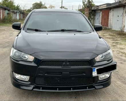Чорний Міцубісі Lancer, об'ємом двигуна 2 л та пробігом 203 тис. км за 6976 $, фото 1 на Automoto.ua