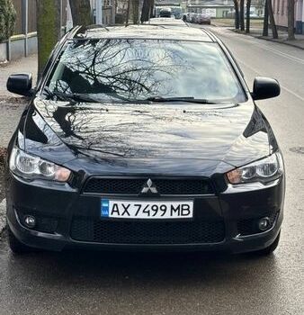 Черный Мицубиси Лансер, объемом двигателя 1.8 л и пробегом 137 тыс. км за 7200 $, фото 1 на Automoto.ua