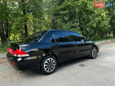 Міцубісі Lancer 2009 у Кременчуге на Automoto.ua Чорний Міцубісі Lancer, об'ємом двигуна 1.6 л та пробігом 150 тис. км за 5900 $, фото 1 на Automoto.ua