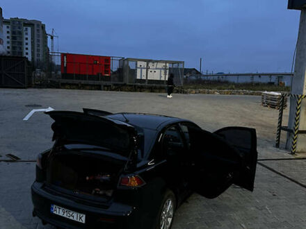 Черный Мицубиси Лансер, объемом двигателя 1.5 л и пробегом 182 тыс. км за 7400 $, фото 1 на Automoto.ua