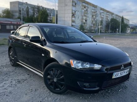 Чорний Міцубісі Lancer, об'ємом двигуна 2 л та пробігом 100 тис. км за 6900 $, фото 1 на Automoto.ua